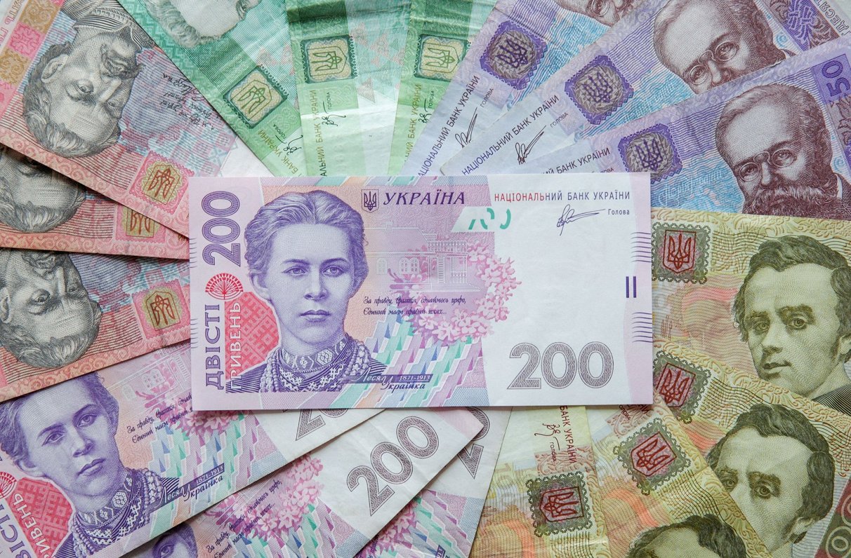 Hrivna a atins un minim istoric față de dolar: moneda ucraineană continuă să se deprecieze