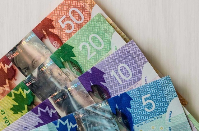 Dolarul canadian scade la cel mai slab nivel din ultimele două luni și jumătate din cauza tensiunilor din Orientul Mijlociu